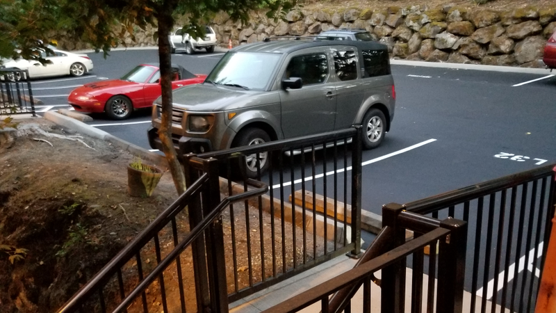 Honda element is in my old spot. My new spot is out of the picture, two spots to the left of the white Z. Has my unit # and everything.